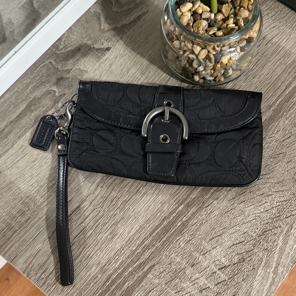 Black quilted Coach wristlet
